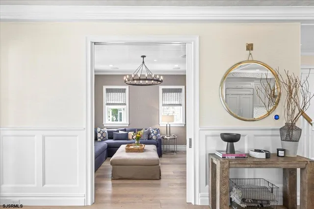 a large kitchen with a table and chairs