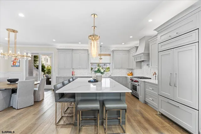 a outdoor living room with furniture and a potted plant