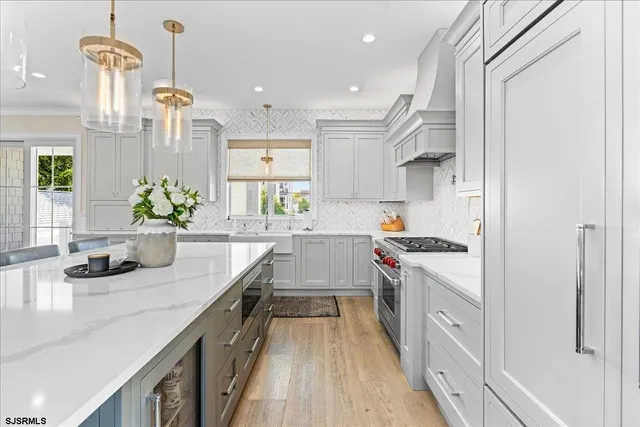 a view of a hallway with seating area
