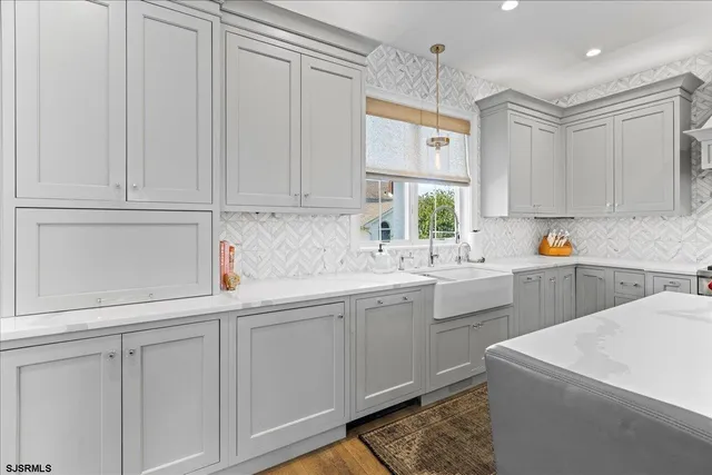 a bedroom with furniture and a fireplace