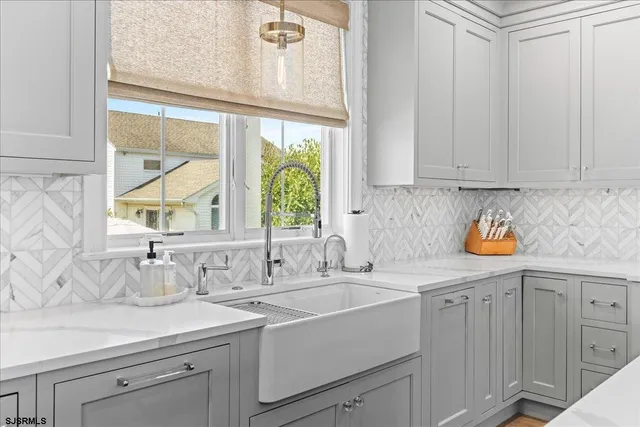 a spacious bathroom with a double vanity sink mirror and