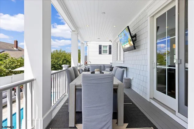 a kitchen with a stove a sink and a window