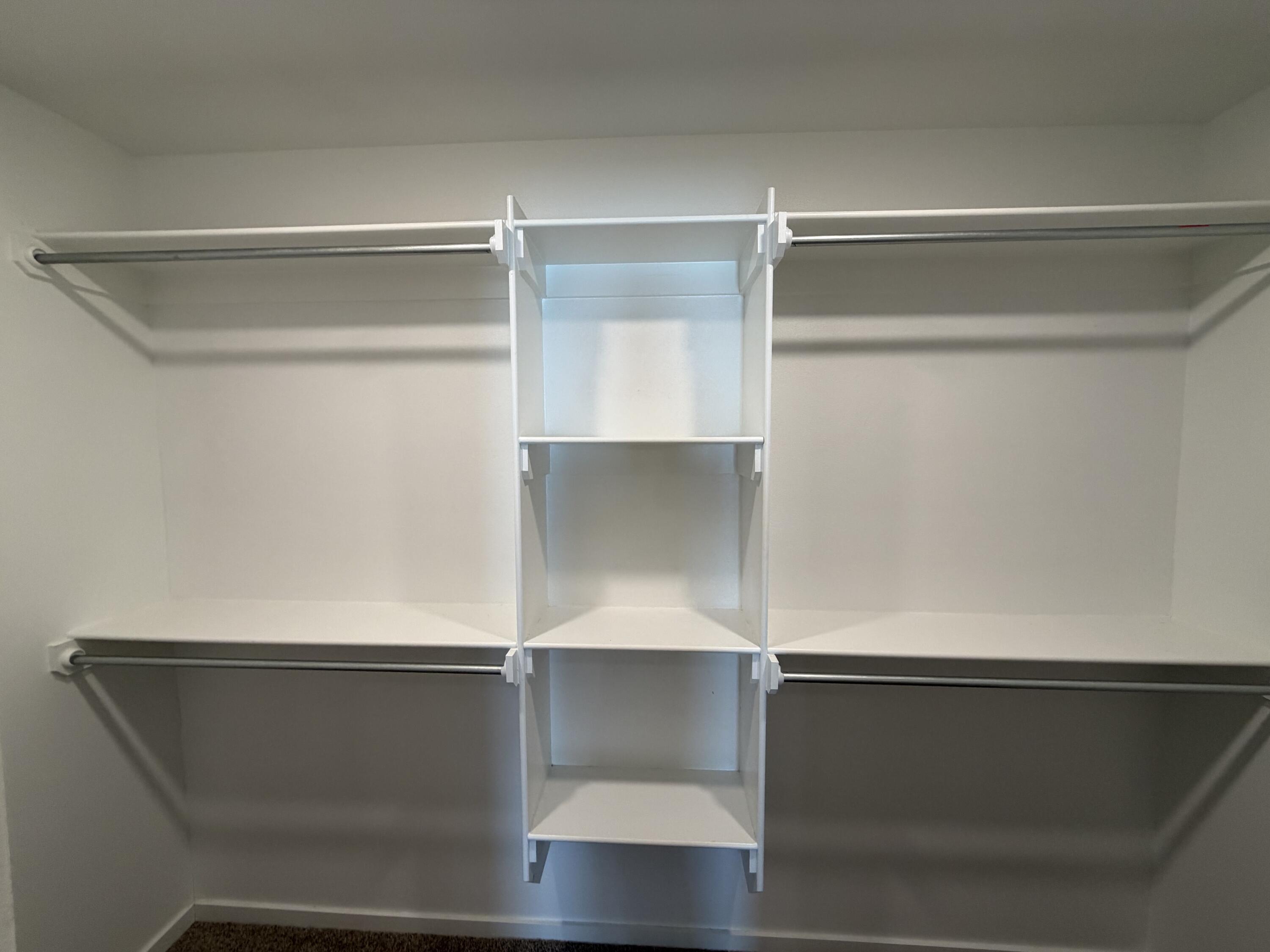 1619 133rd Street, Unit B Lubbock, TX 79423 - Photo 16 of 24 a view of an empty walk in closet
