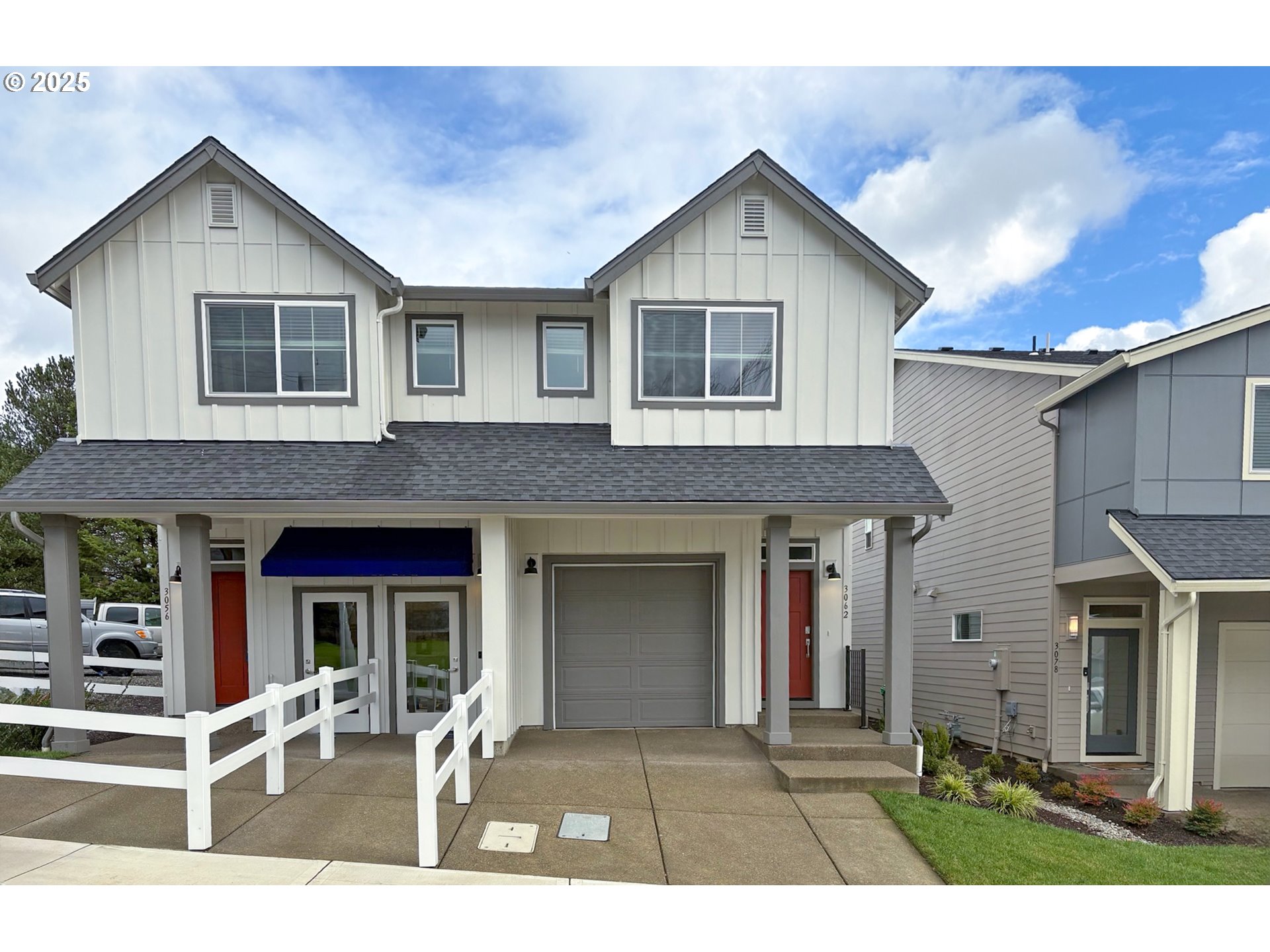 3056 Southwest Linneman Drive Gresham, OR 97080 - Photo 1 of 20 a front view of a house with yard