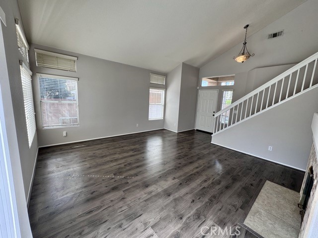 43370 Corte Benitez Temecula, CA 92592 - Photo 13 of 46 a view of an empty room with wooden floor and a window