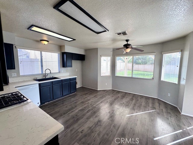 43370 Corte Benitez Temecula, CA 92592 - Photo 16 of 46 a kitchen with stainless steel appliances granite countertop a stove a sink and a refrigerator