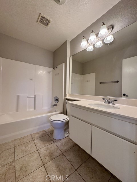 43370 Corte Benitez Temecula, CA 92592 - Photo 21 of 46 a bathroom with a toilet sink and mirror