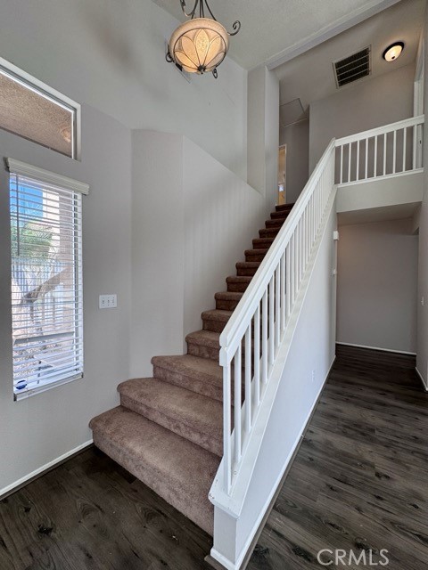 43370 Corte Benitez Temecula, CA 92592 - Photo 24 of 46 a view of staircase with wooden floor and staircase