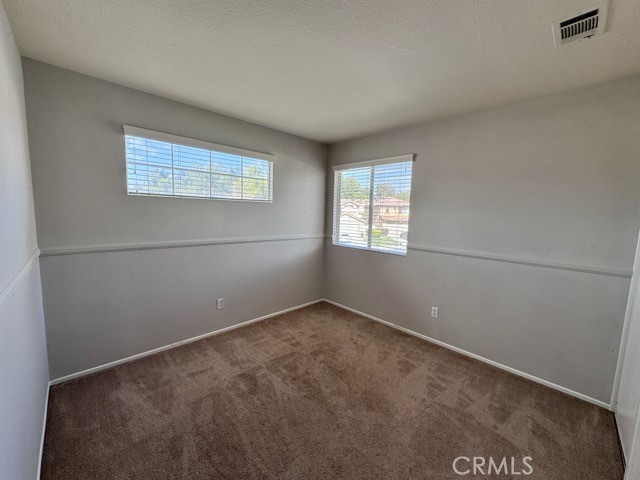 43370 Corte Benitez Temecula, CA 92592 - Photo 28 of 46 a view of an empty room with a window