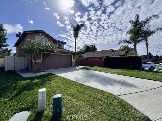 43370 Corte Benitez Temecula, CA 92592 - Photo 4 of 46 a front view of a house with garden