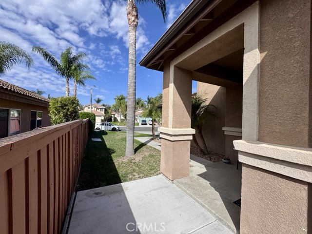 43370 Corte Benitez Temecula, CA 92592 - Photo 8 of 46 a view of a patio with table and chairs and potted plants
