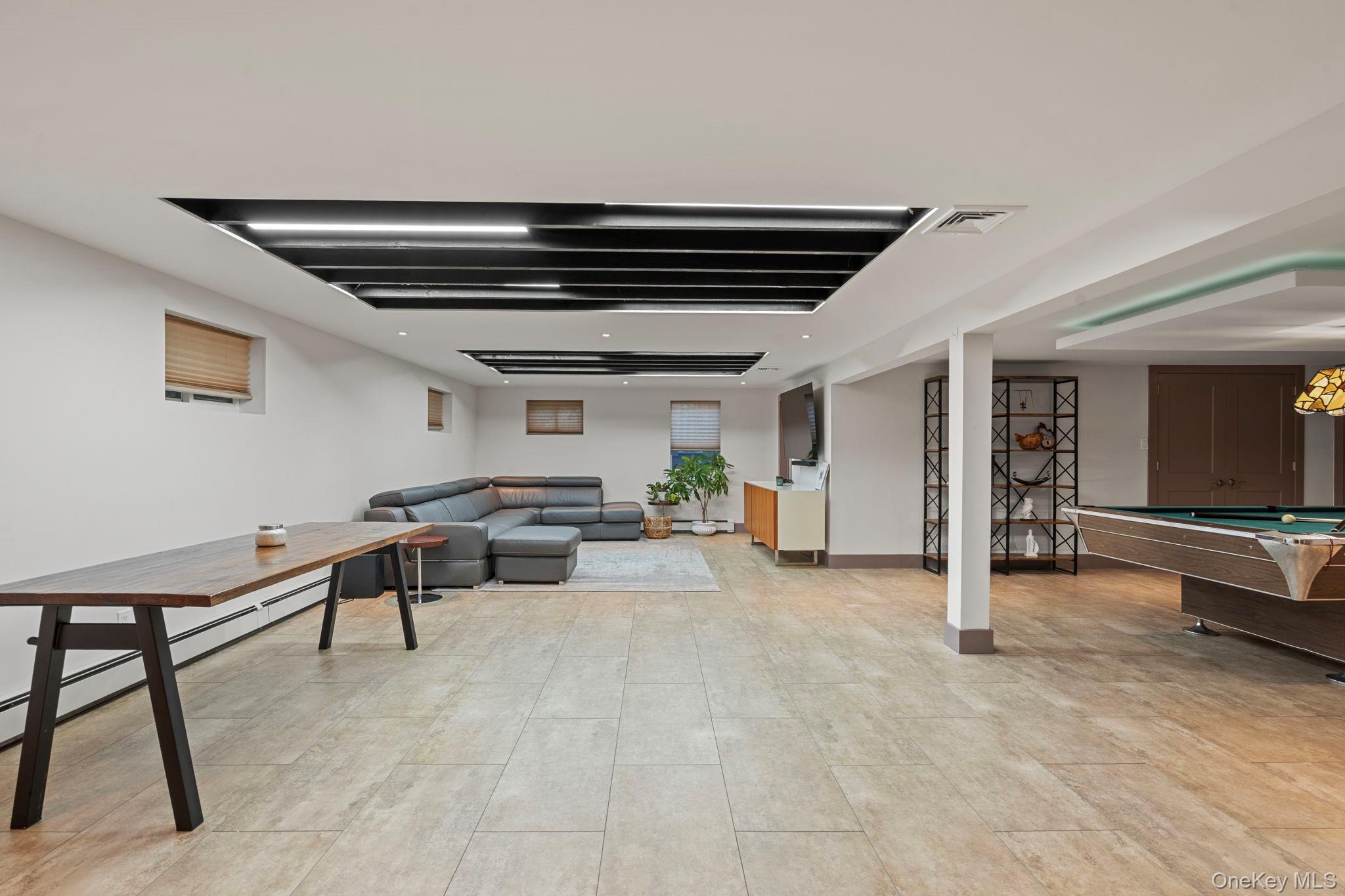 158 Old Courthouse Road Manhasset Hills, NY 11040 - Photo 30 of 47 a view of livingroom with furniture and closet