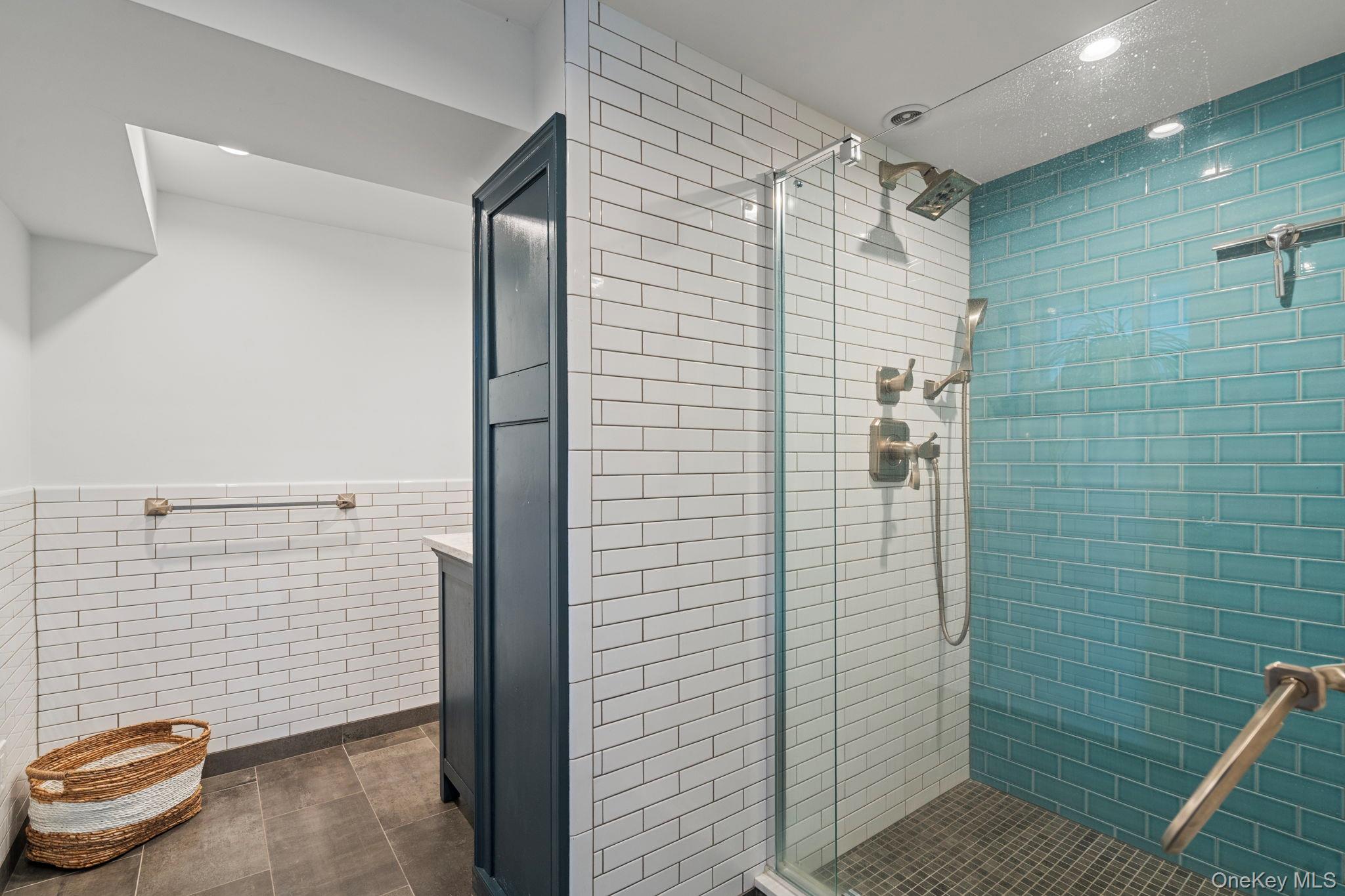 158 Old Courthouse Road Manhasset Hills, NY 11040 - Photo 36 of 47 a bathroom with a toilet and a shower