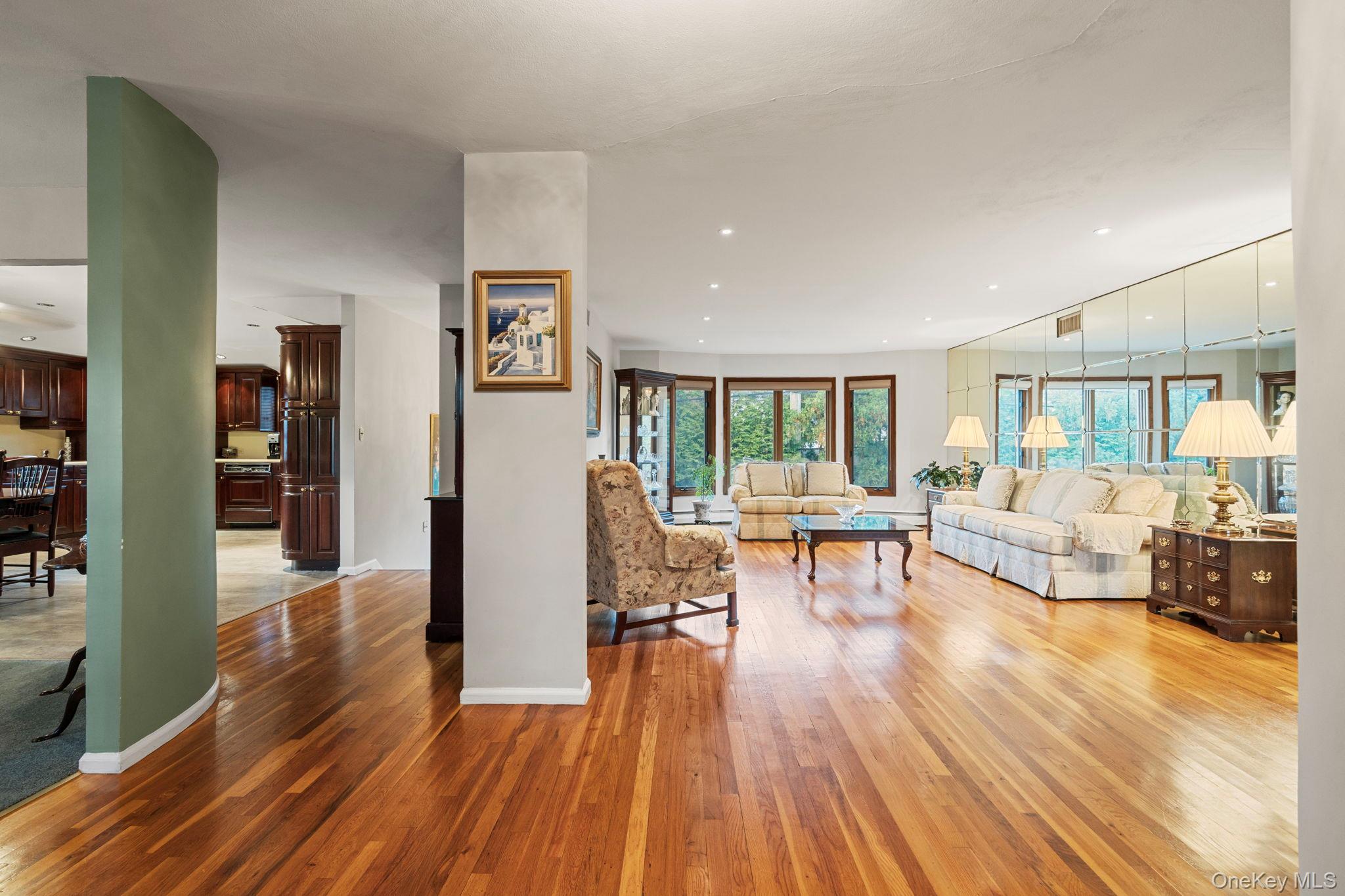 158 Old Courthouse Road Manhasset Hills, NY 11040 - Photo 5 of 47 a living room with furniture and a wooden floor