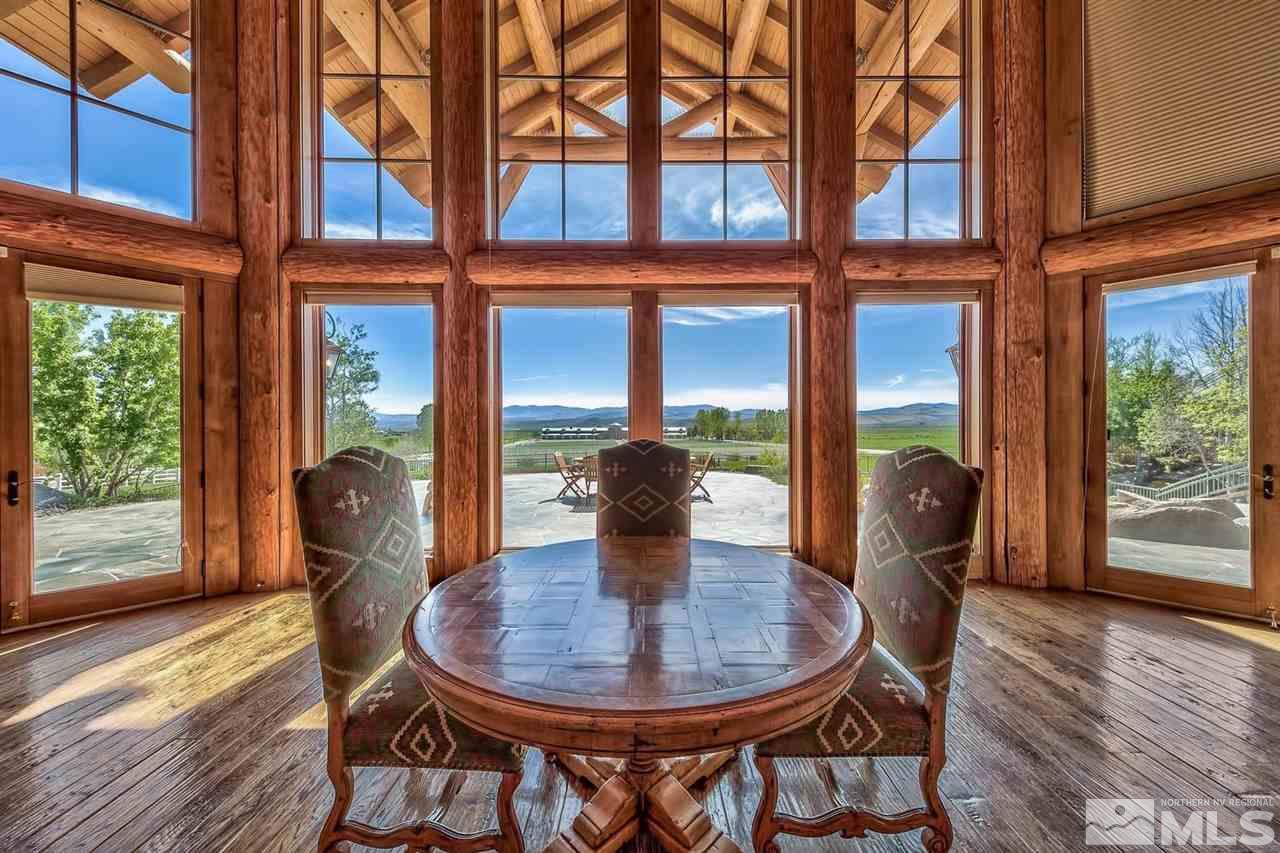 277 Fredricksburg Road Gardnerville, NV 89460 - Photo 12 of 27 a view of a dining room with furniture window and wooden floor