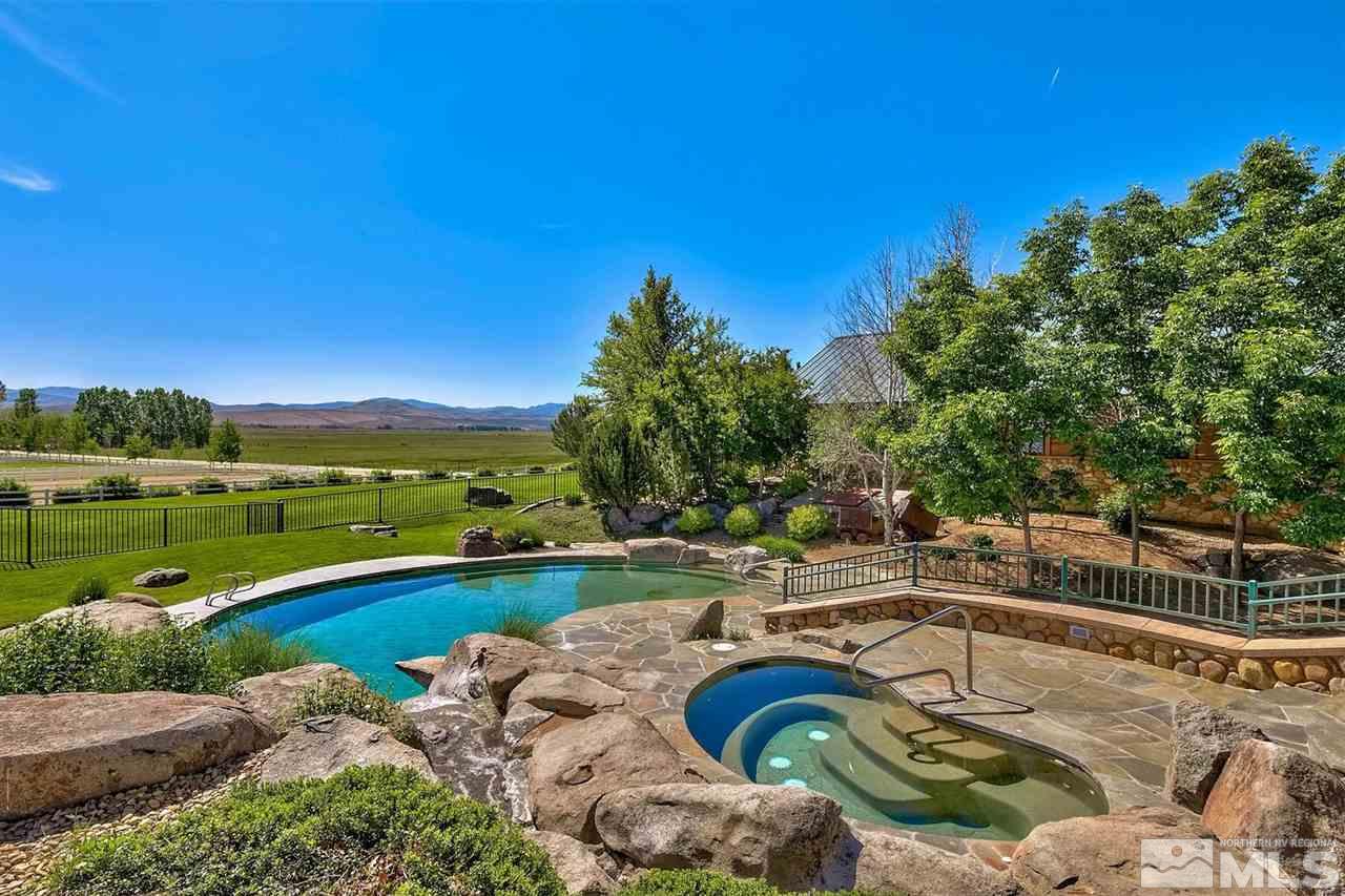 277 Fredricksburg Road Gardnerville, NV 89460 - Photo 3 of 27 a view of a swimming pool with a patio