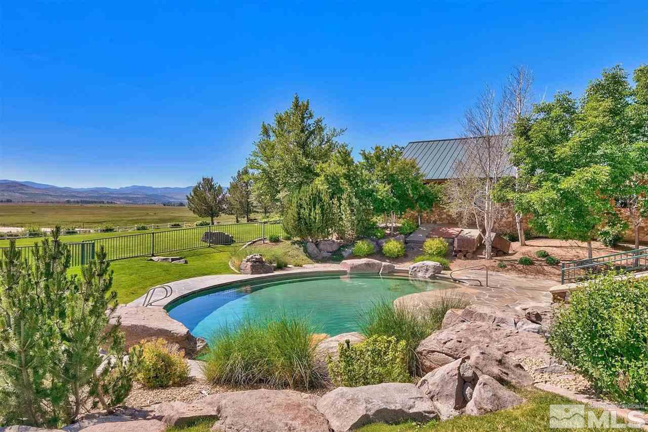 277 Fredricksburg Road Gardnerville, NV 89460 - Photo 4 of 27 a view of a street with a yard