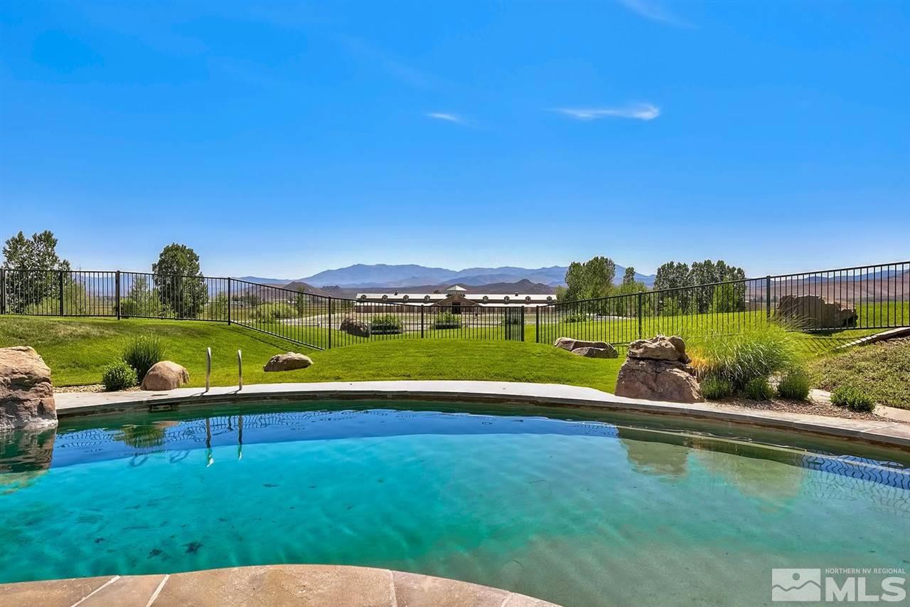 277 Fredricksburg Road Gardnerville, NV 89460 - Photo 5 of 27 a view of a lake with a yard
