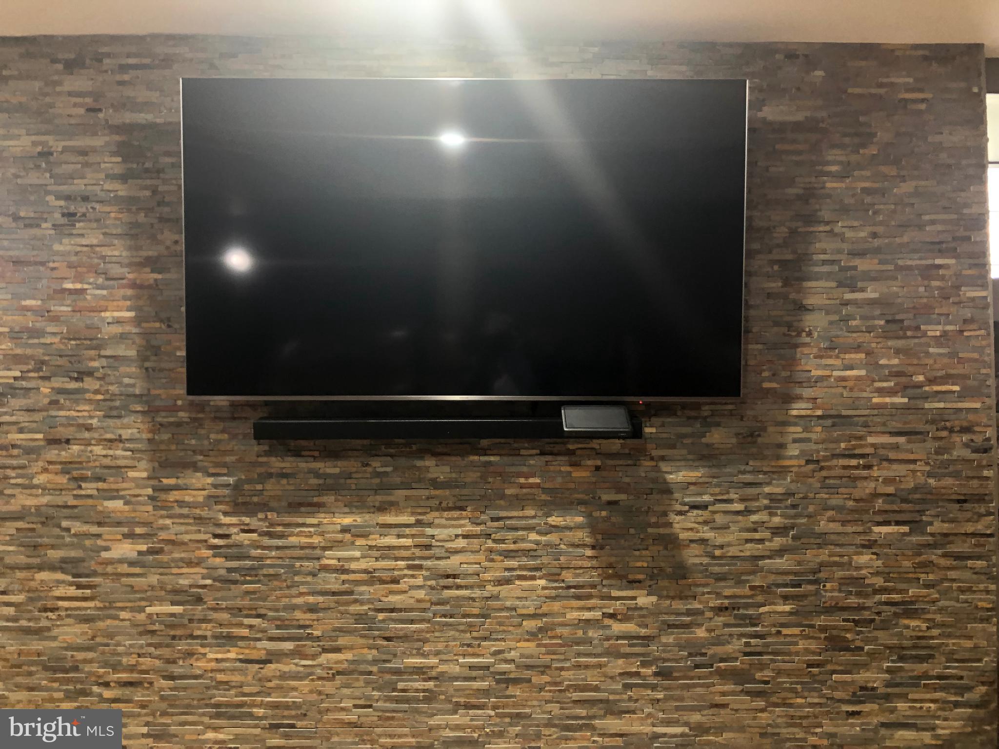 207 Mallow Hill Road Baltimore, MD 21229 - Photo 52 of 65 Lower Level Stone Accent Wall