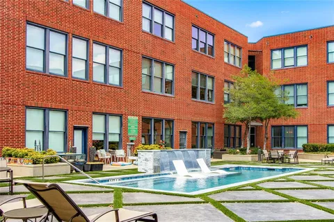 a view of a building with a swimming pool