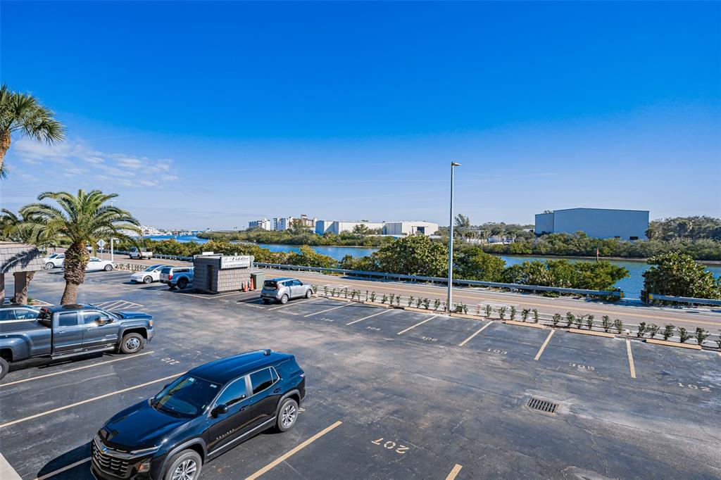 60 Gulf Boulevard, Unit 203 Indian Rocks Beach, FL 33785 - Photo 45 of 53 a view of a street with cars parked
