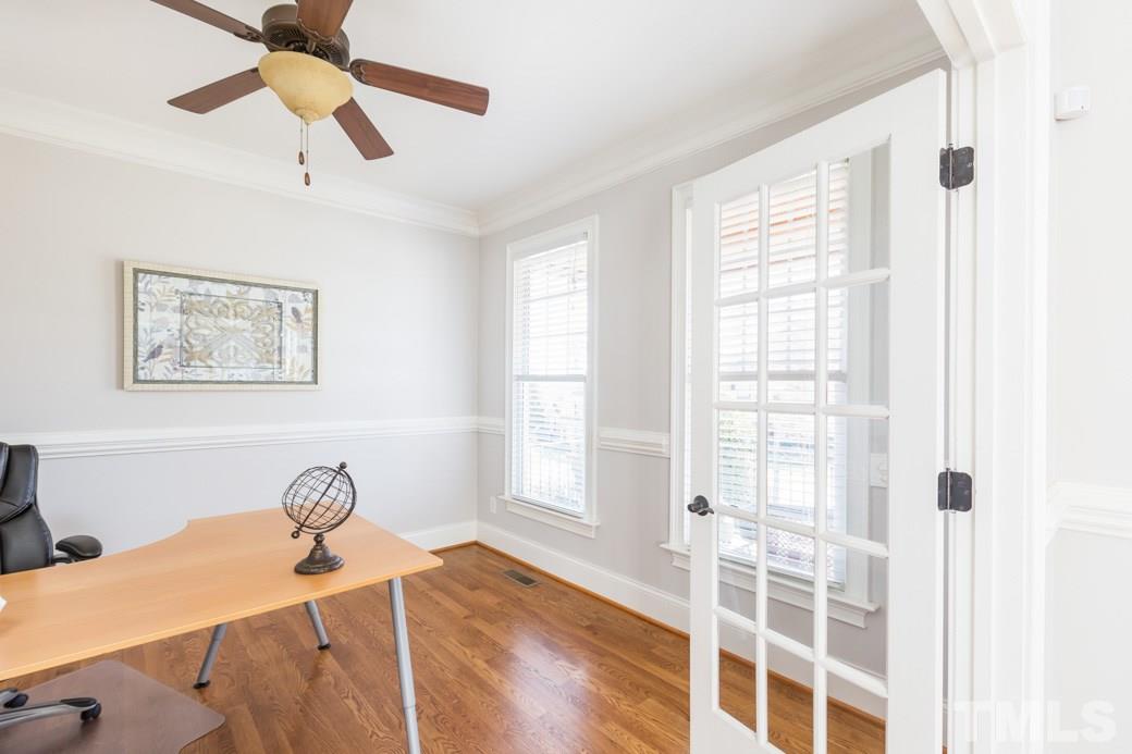 5342 Landguard Drive Raleigh, NC 27613 - Photo 13 of 25 a bed sitting in a bedroom next to a window