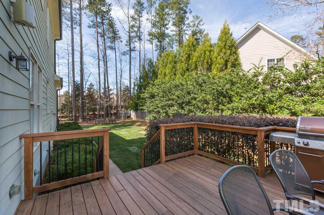5342 Landguard Drive Raleigh, NC 27613 - Photo 24 of 25 a view of deck with mountain view and wooden floor