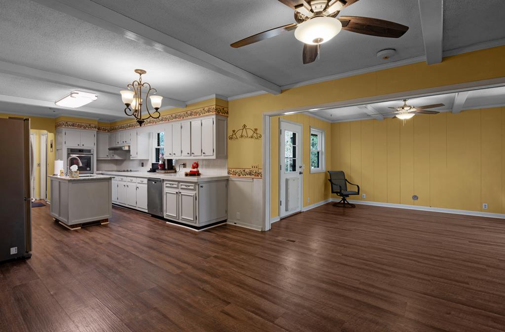 1550 Highway 2 Blue Ridge, GA 30513 - Photo 10 of 46 a view of a kitchen with a sink wooden floor and a kitchen
