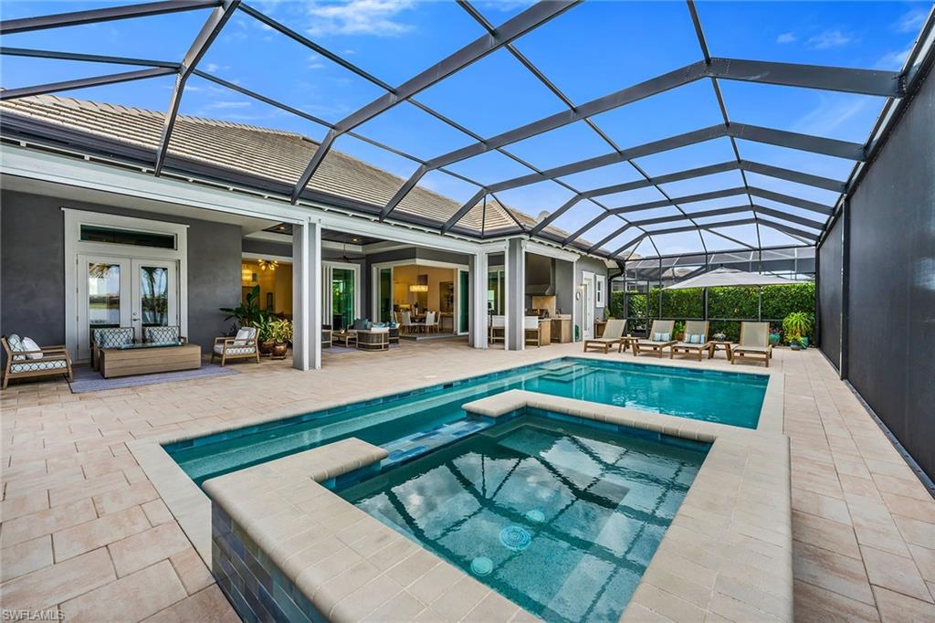 6184 Antigua Way Naples, FL 34113 - Photo 21 of 49 a view of swimming pool with a patio