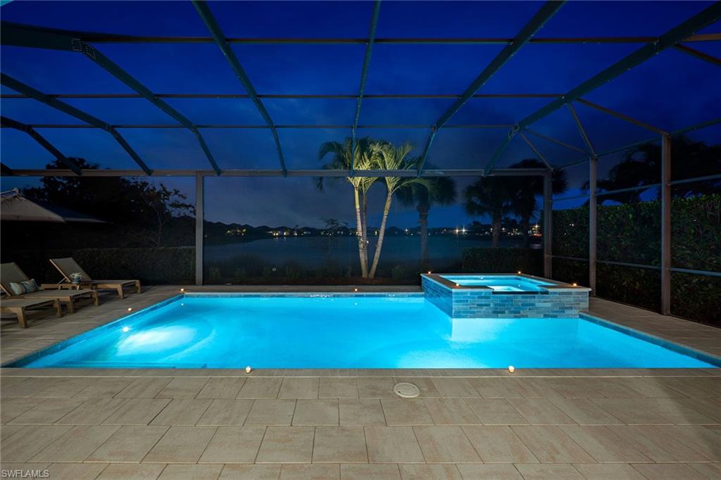 6184 Antigua Way Naples, FL 34113 - Photo 25 of 49 a view of a room with gym equipment