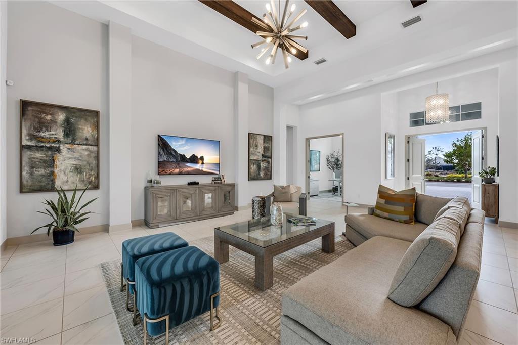 6184 Antigua Way Naples, FL 34113 - Photo 4 of 49 a living room with furniture