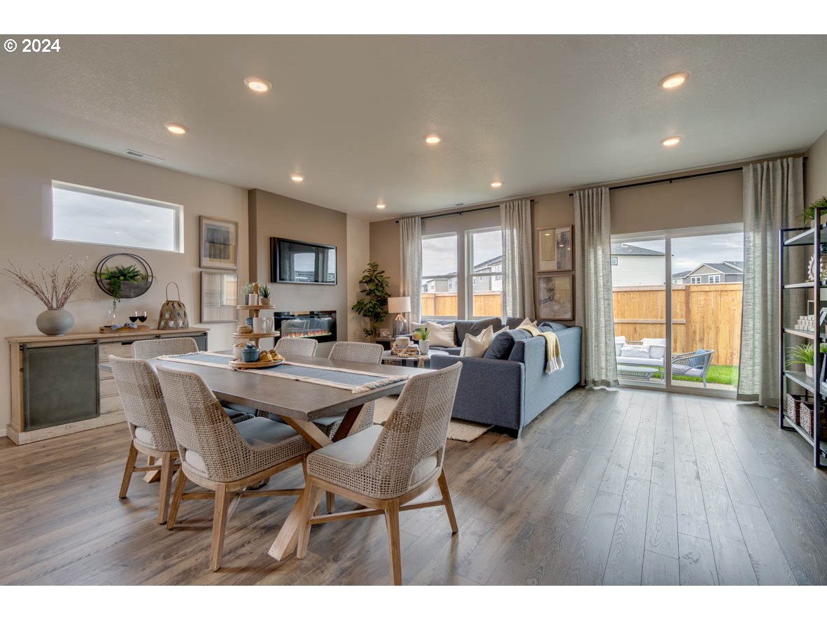 2961 V Street Springfield, OR 97477 - Photo 14 of 24 a view of a dining room with furniture window and wooden floor
