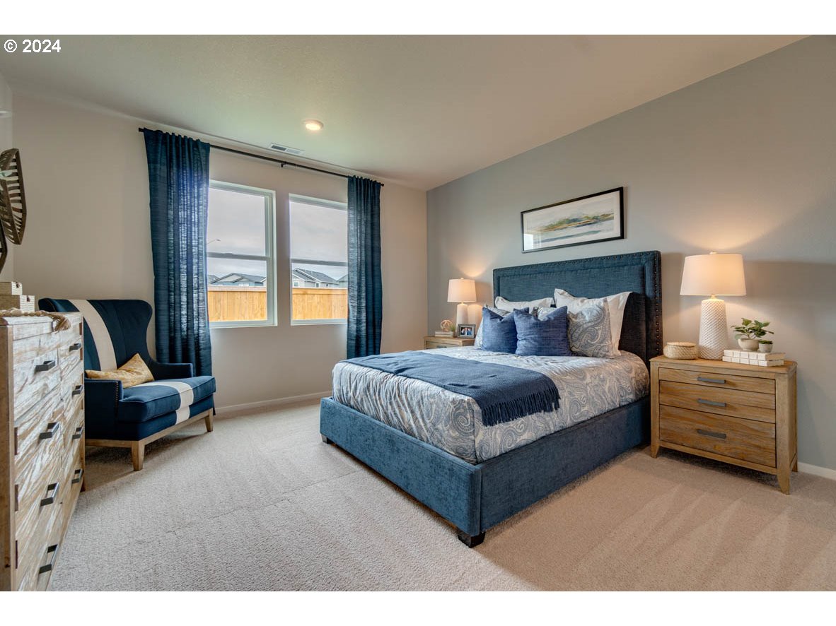 2961 V Street Springfield, OR 97477 - Photo 17 of 24 a bedroom with a bed and a window