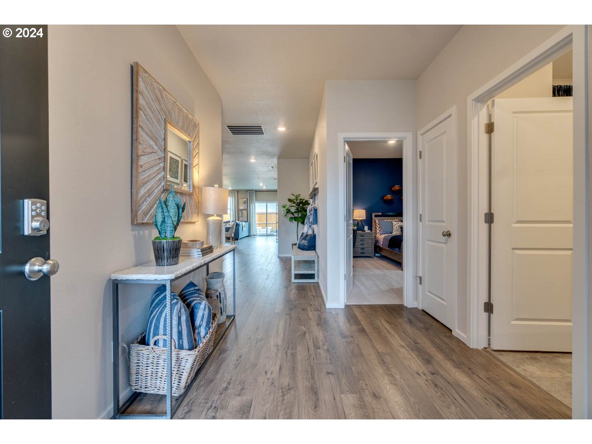 2961 V Street Springfield, OR 97477 - Photo 3 of 24 a view of a hallway view with wooden floor and dining room