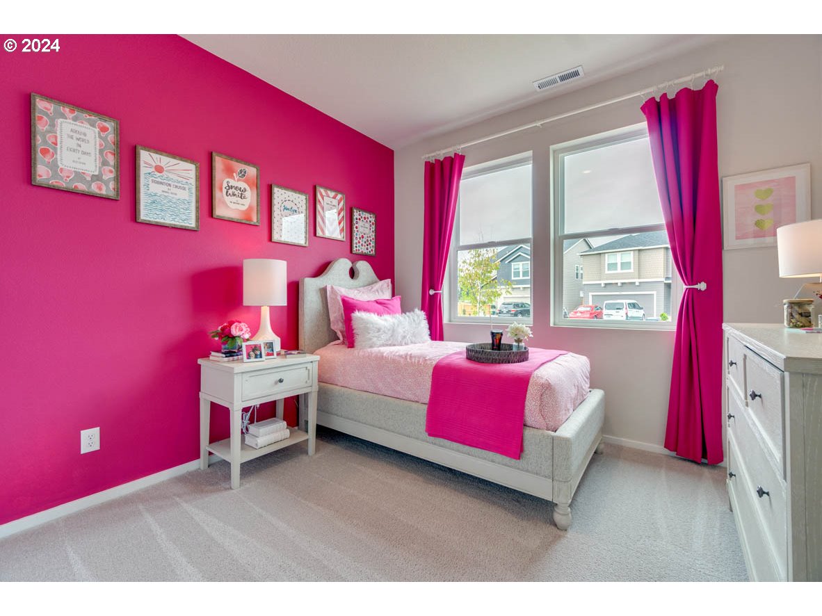 2961 V Street Springfield, OR 97477 - Photo 4 of 24 a bedroom with a bed and a window