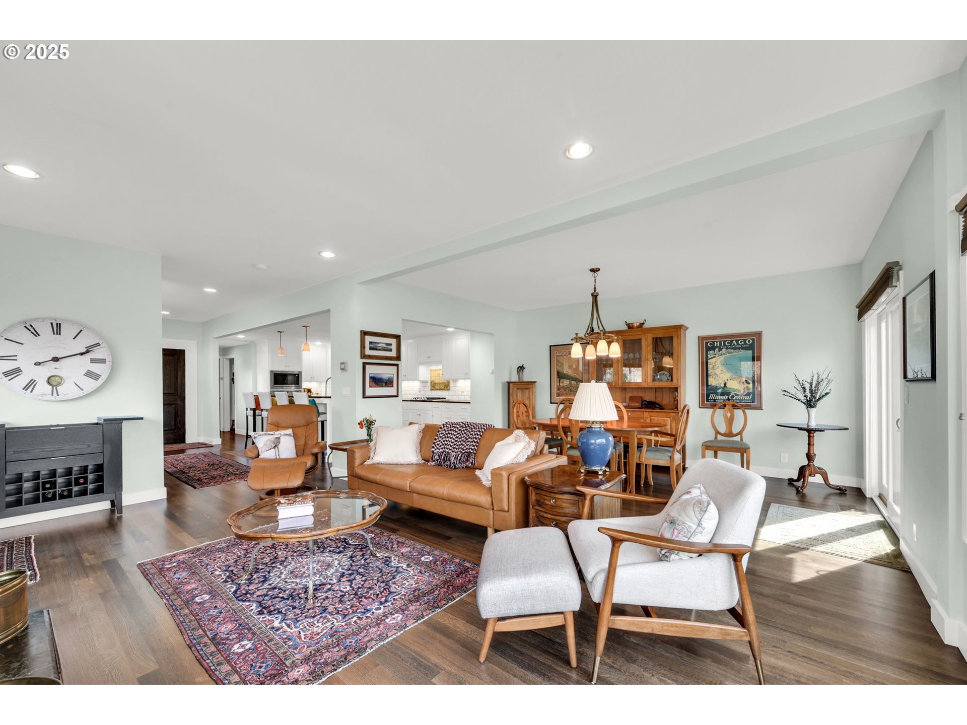 579 Wimbledon Court Eugene, OR 97401 - Photo 14 of 46 a living room with furniture a rug and a fireplace