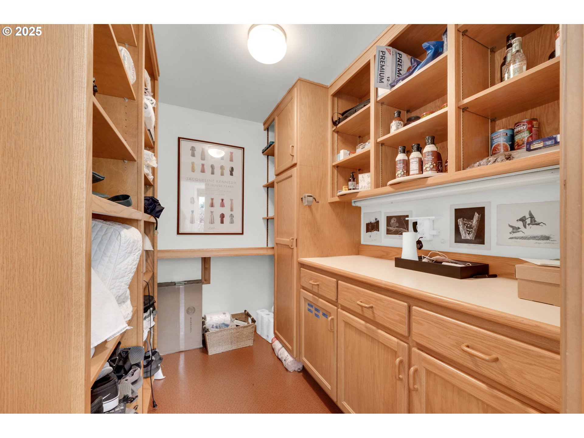 579 Wimbledon Court Eugene, OR 97401 - Photo 25 of 46 a kitchen with cabinets and painting on the wall