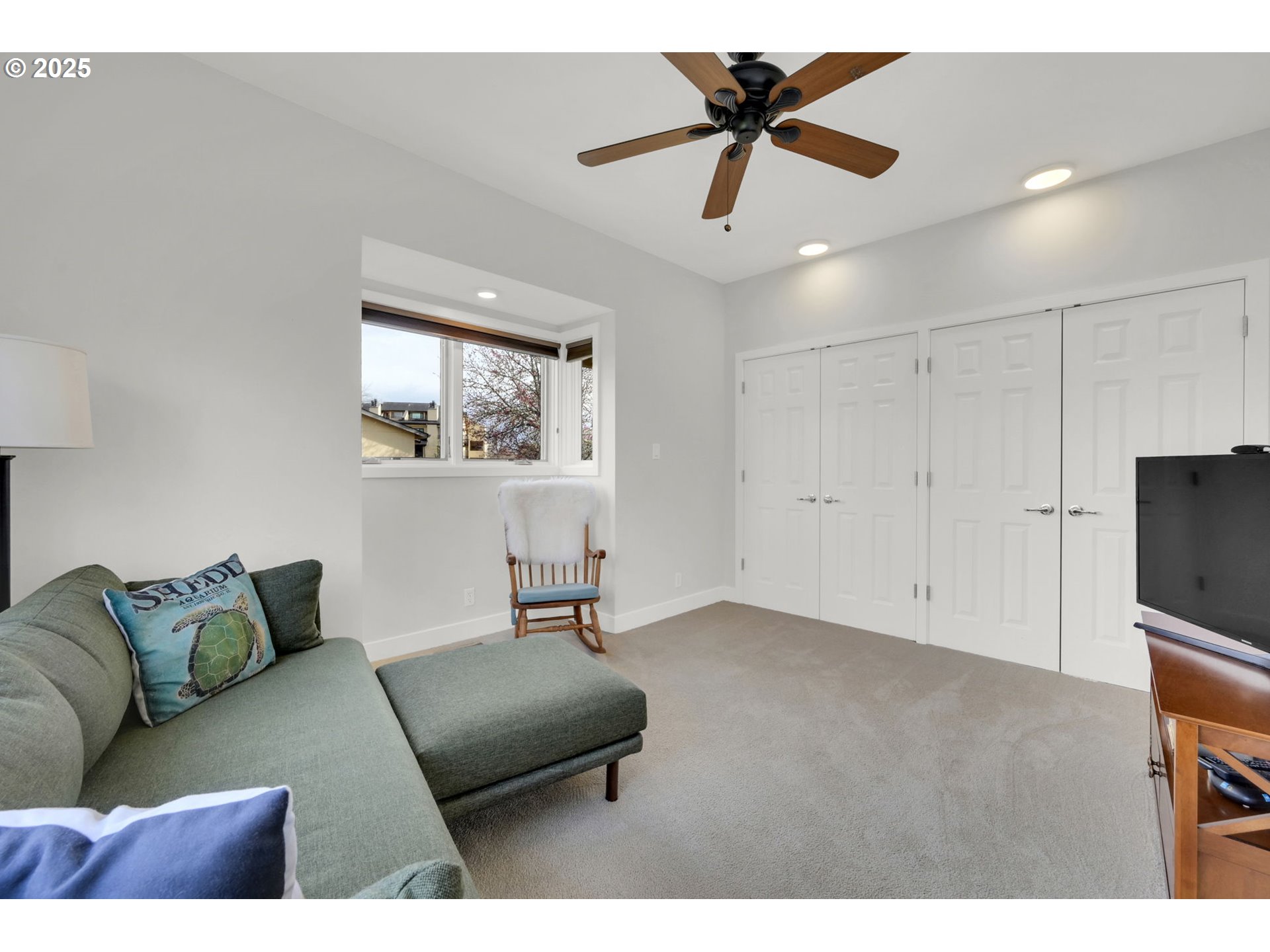 579 Wimbledon Court Eugene, OR 97401 - Photo 32 of 46 a bedroom with furniture and a large window