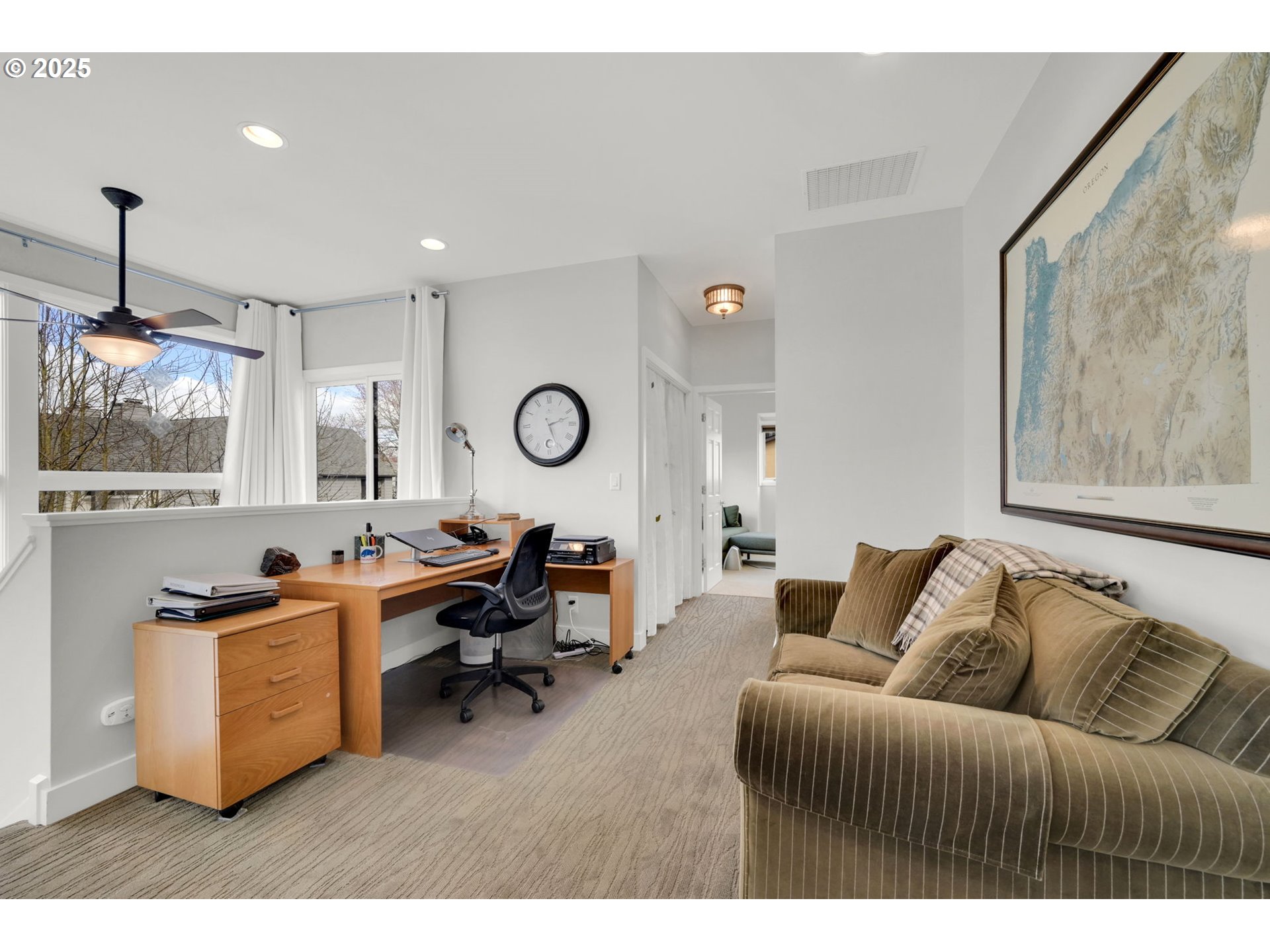 579 Wimbledon Court Eugene, OR 97401 - Photo 37 of 46 a living room with furniture window and a flat screen tv