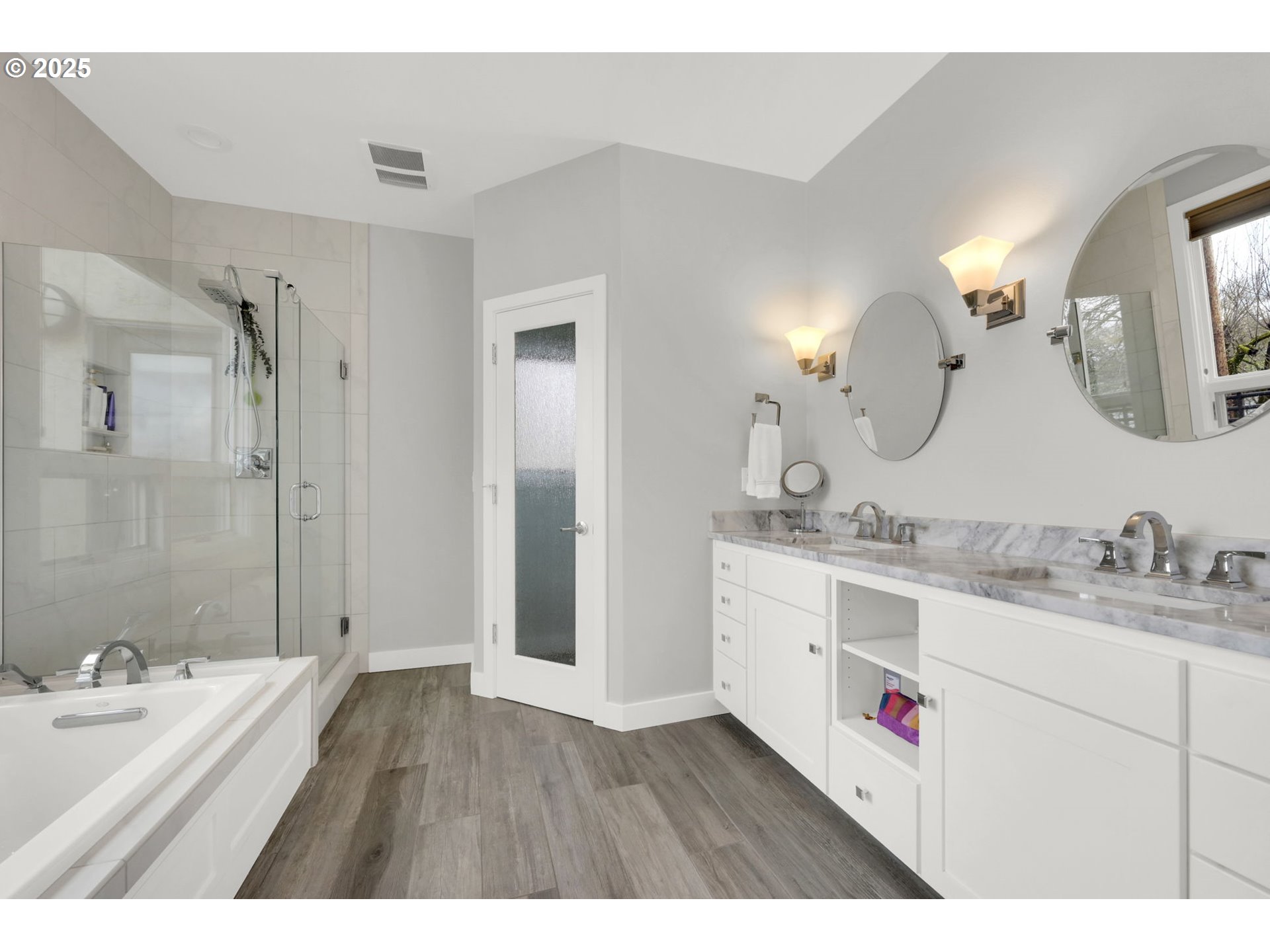 579 Wimbledon Court Eugene, OR 97401 - Photo 39 of 46 a en suite bathroom with a granite countertop sink mirror and double
