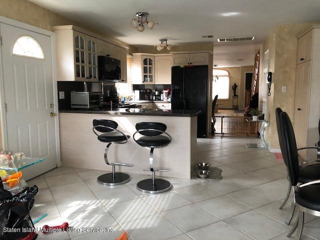 3078 Richmond Road Staten Island, NY 10306 - Photo 7 of 31 Main Kitchen Door to Yard