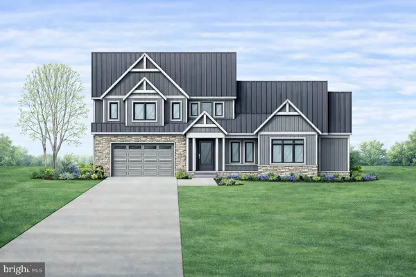 a view of front of house with a yard