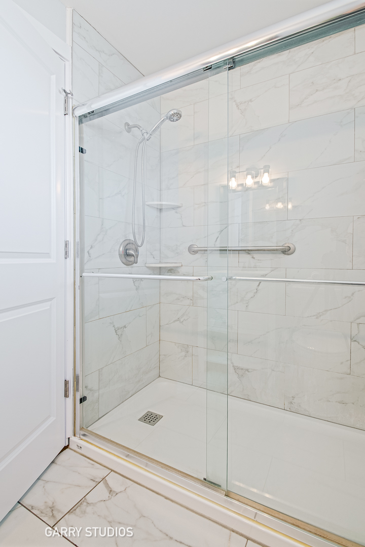 1212 North Wheeling Road Mount Prospect, IL 60056 - Photo 14 of 19 a bathroom with a shower