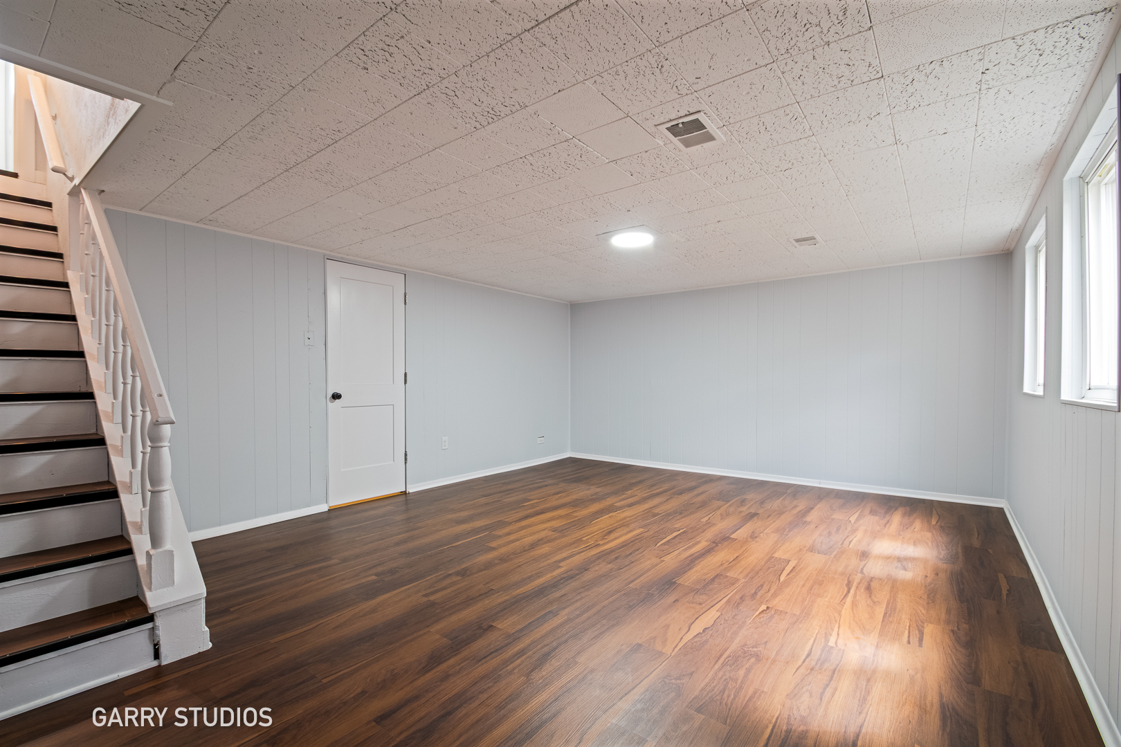 1212 North Wheeling Road Mount Prospect, IL 60056 - Photo 15 of 19 a view of empty room with wooden floor and fan