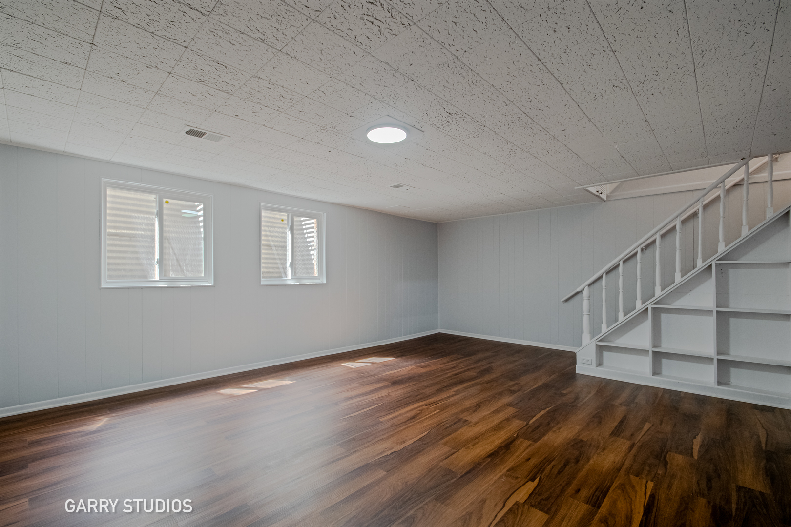 1212 North Wheeling Road Mount Prospect, IL 60056 - Photo 16 of 19 a view of an empty room with wooden floor and a window