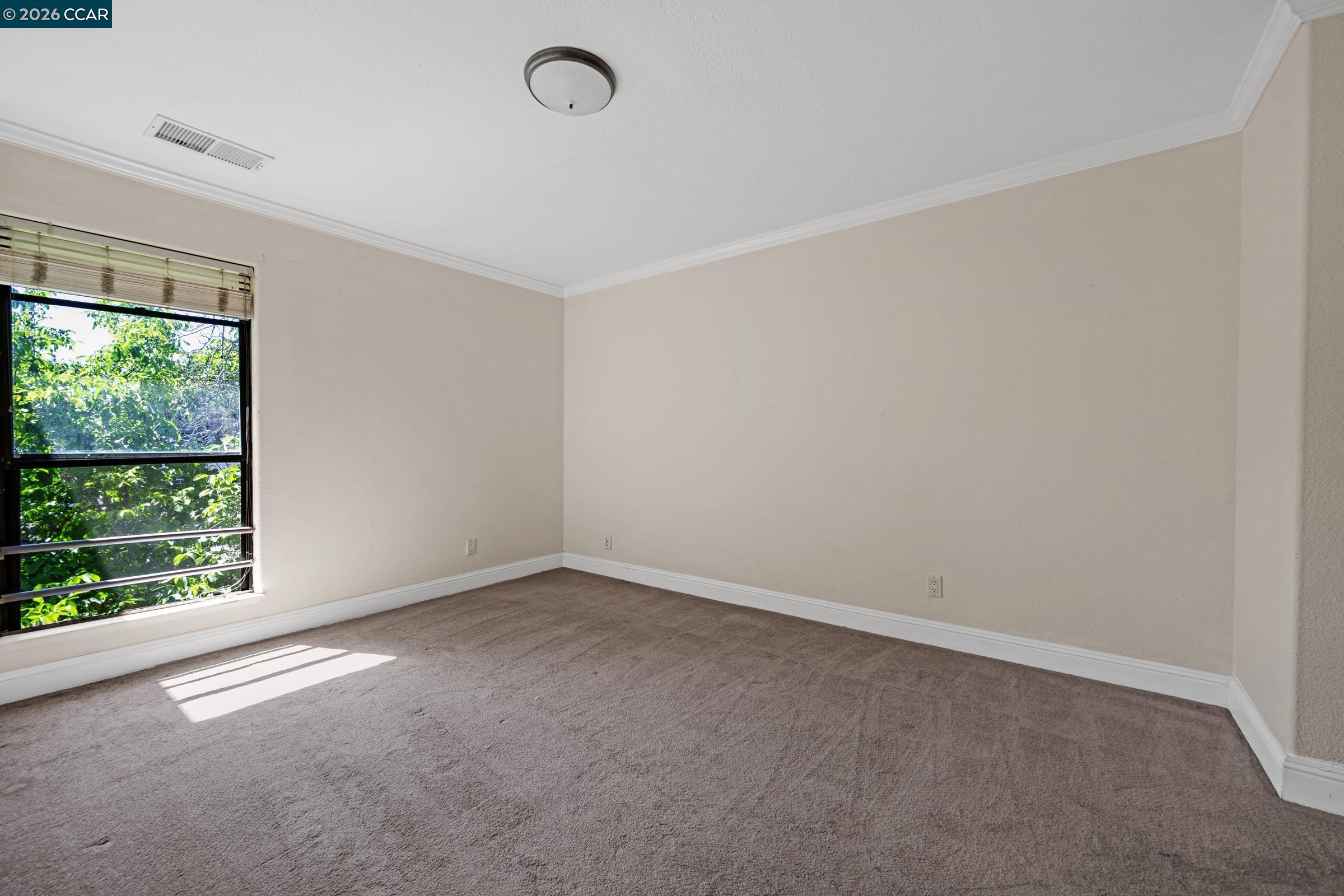 1544 Bailey Road, Unit 30 Concord, CA 94521 - Photo 20 of 33 an empty room with a window