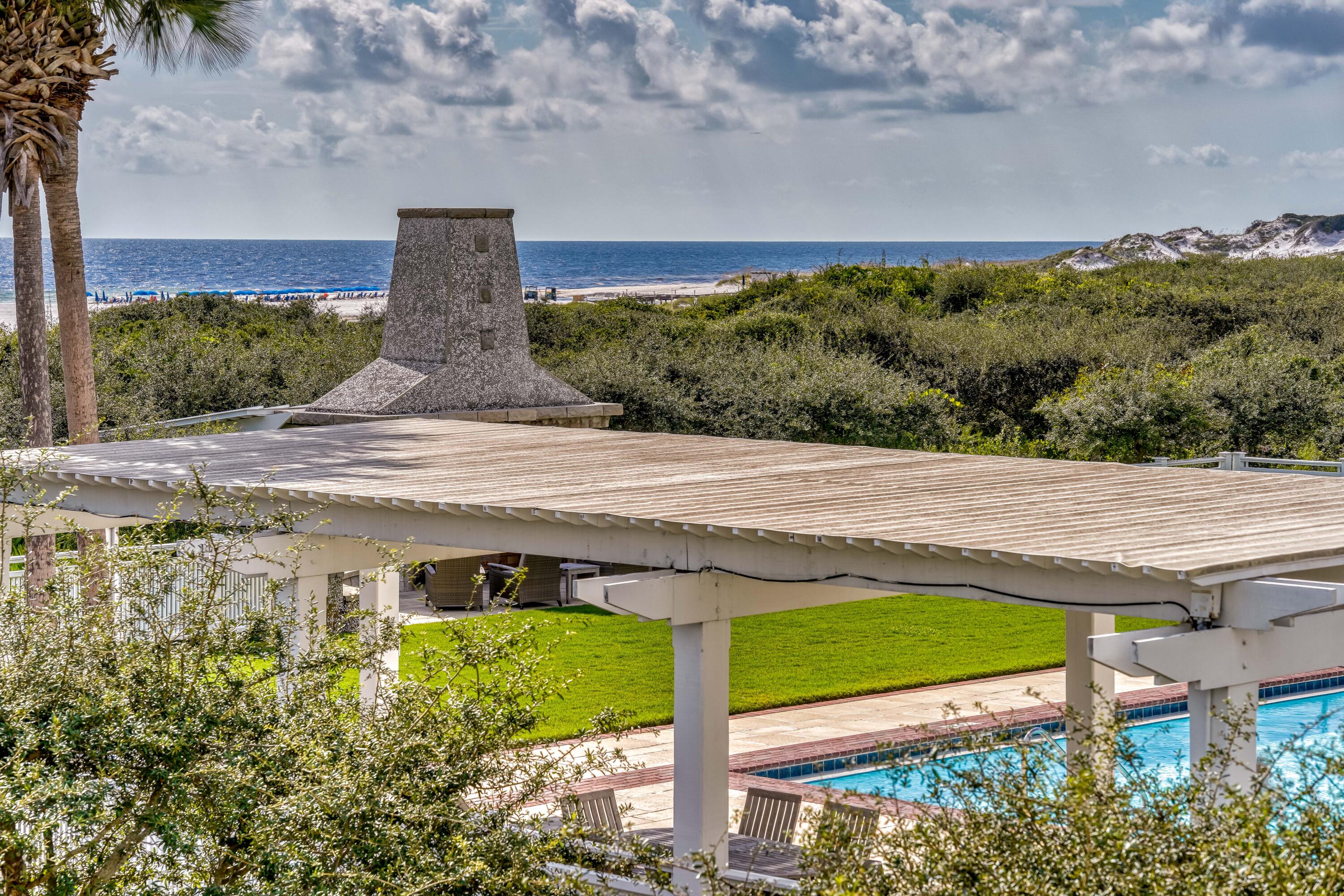 100 Bridge Lane, Unit C112 Watersound, FL 32461 - Photo 15 of 43 a view of a terrace with a yard