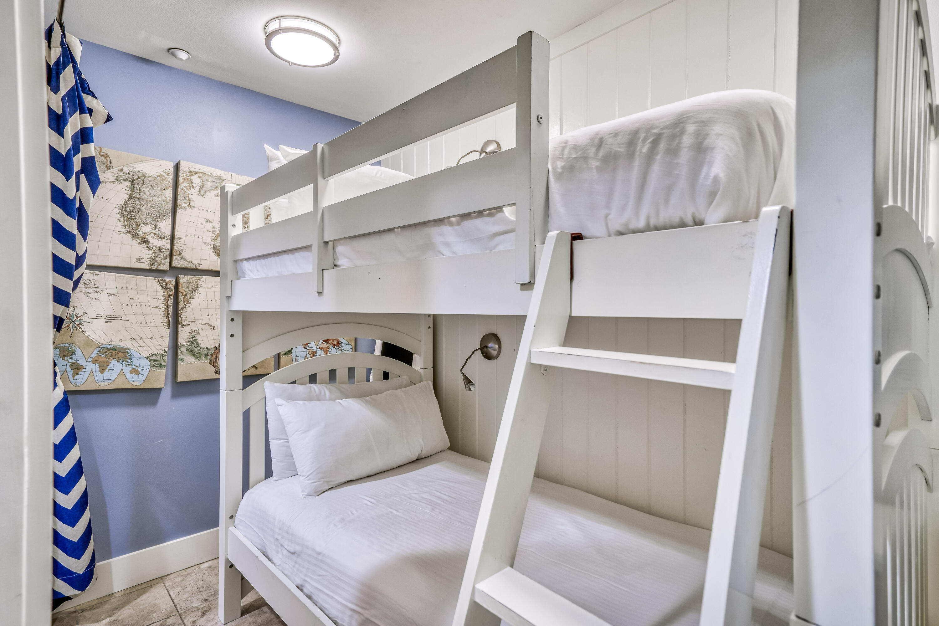 100 Bridge Lane, Unit C112 Watersound, FL 32461 - Photo 23 of 43 a bedroom with a bed and a table