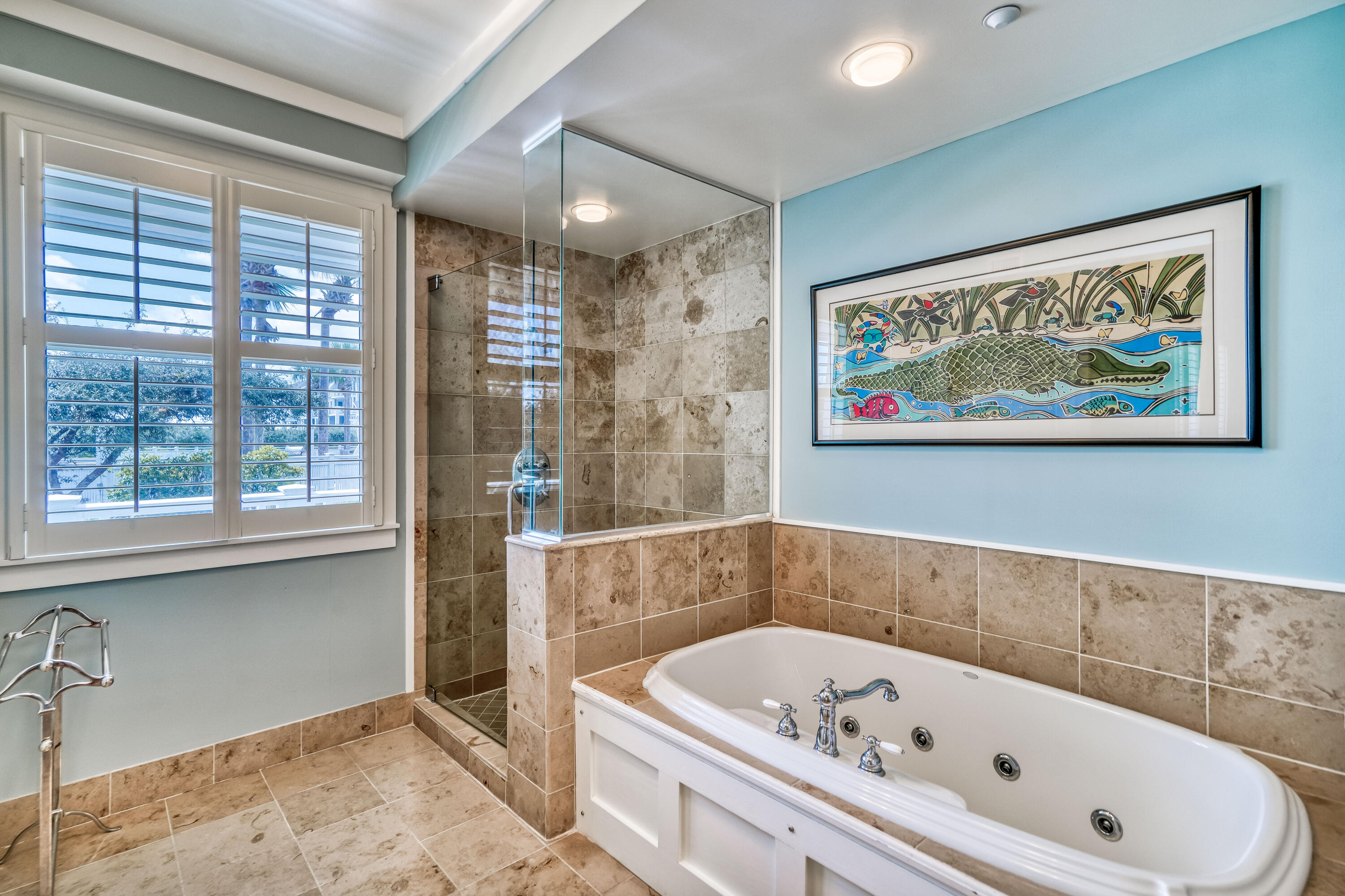 100 Bridge Lane, Unit C112 Watersound, FL 32461 - Photo 26 of 43 a bathroom with a bathtub and a window