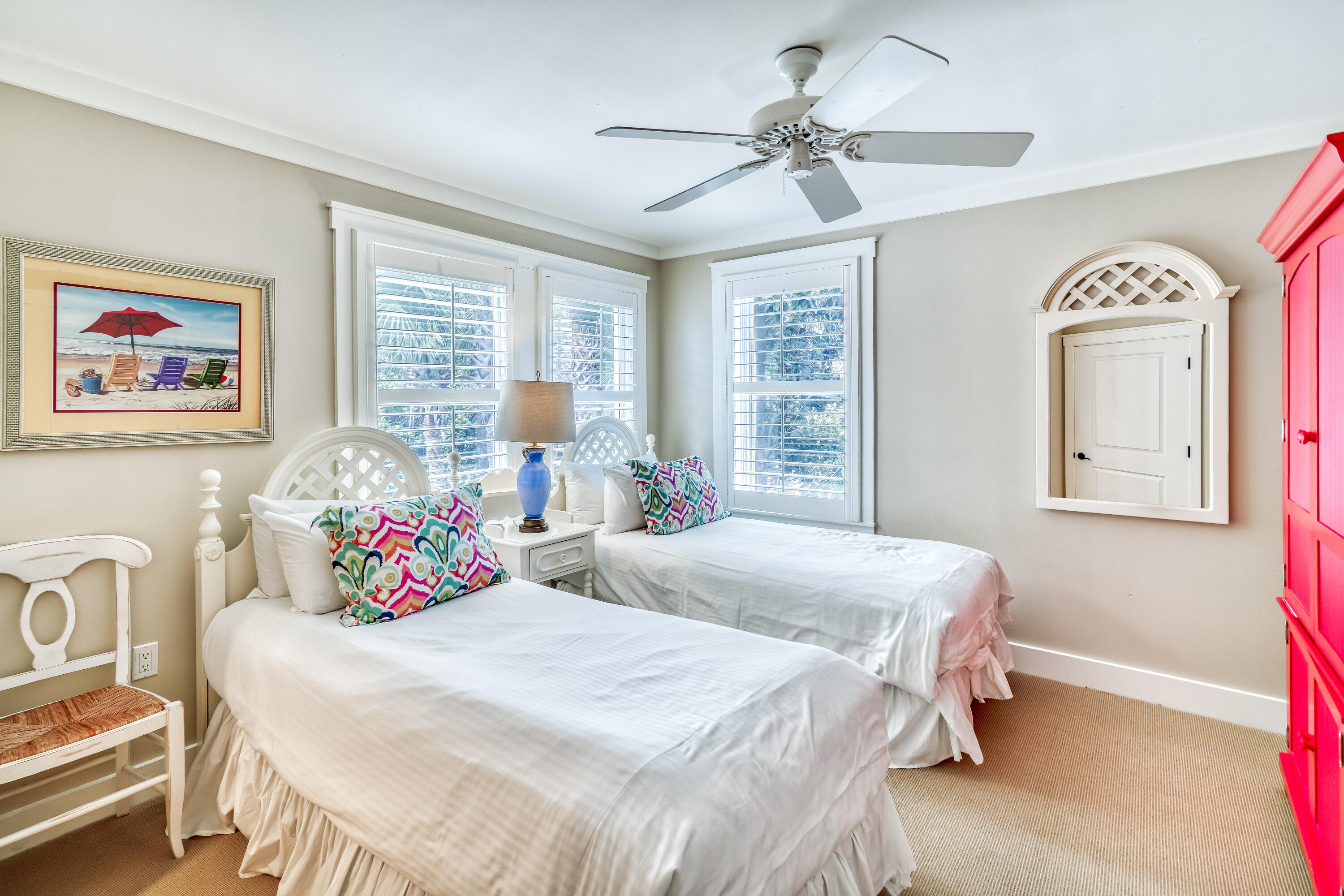 100 Bridge Lane, Unit C112 Watersound, FL 32461 - Photo 30 of 43 a bedroom with a bed and a chandelier